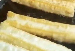 油条技术视频,一招一式解锁传统早餐美味